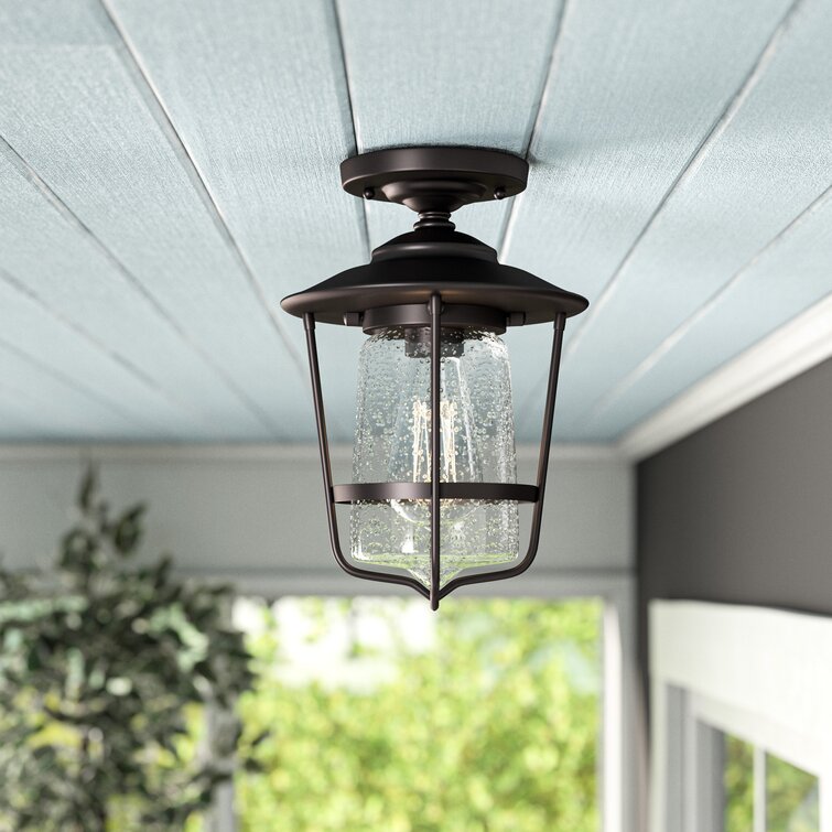 Outdoor semi store flush mount light